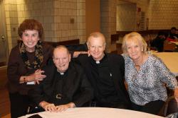 Mary Whalen, Fr. Von Euw, Fr. Finn and Fr. Von Euw’s twin sister celebrate at the luncheon. Photo by Patrick O’Connor